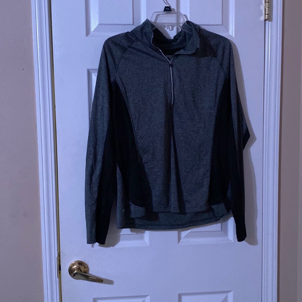 Black and grey light weight, active wear jacket.